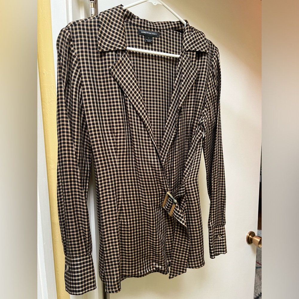 Something Navy tie in the front blouse with belt detail. Size small.
